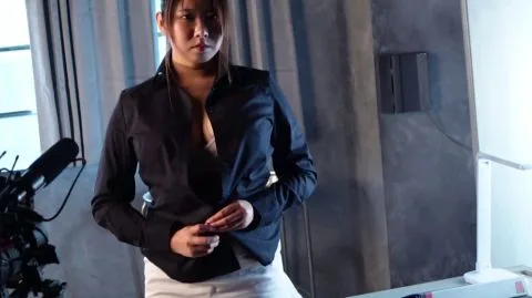 Asian Performer in Industrial Setting – StudioName PerformerName