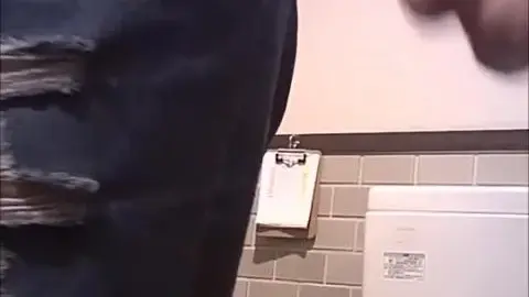 Asian Girls Urinating in Bathroom