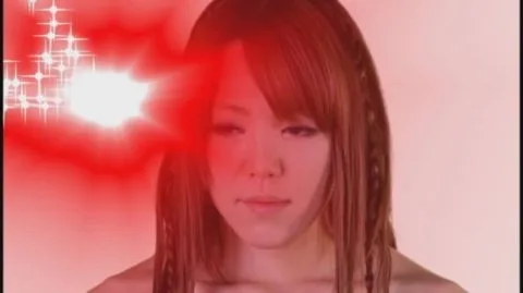 Asian Girl in Pink Costume with Toy Gun