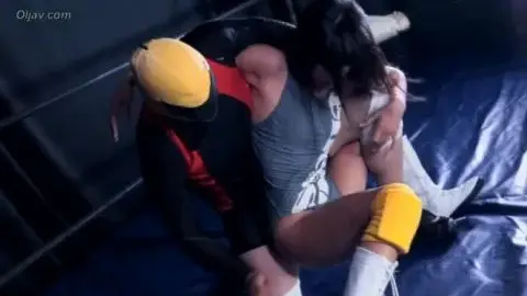 Asian Women Wrestling in Ring