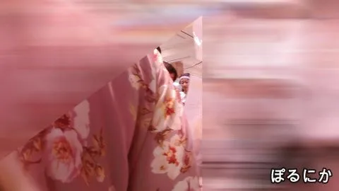 Asian Models Trying On Clothes in Dressing Room