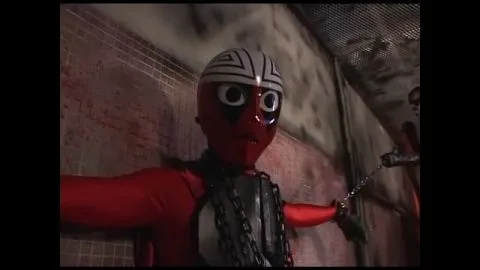 Men in Masks Engage in BDSM Play