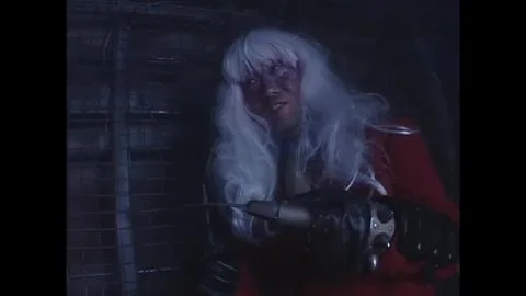 Blonde in Red Dress with Sword and Fishnet Stockings