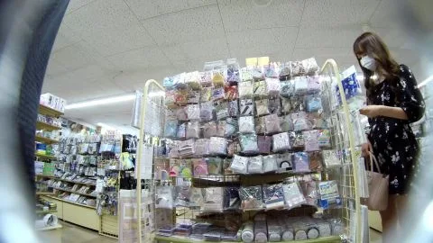 Asian Girls Shopping in Store