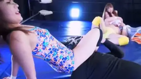 Asian Women Wrestling in Colorful Outfits