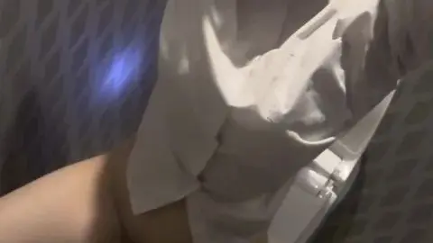 Asian Teen Masturbates in Dimly Lit Bathroom