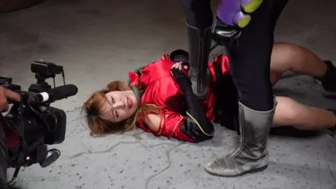 Blonde Asian Woman in Costume Fights Monster