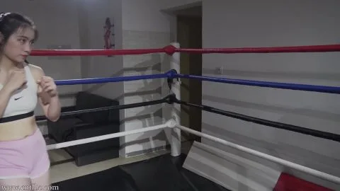 Asian Teen in Boxing Ring