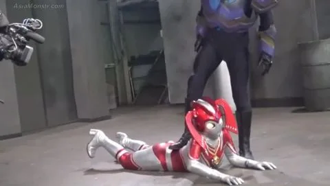 Asian Girl with Glasses in Lab Coat with Muscular Men