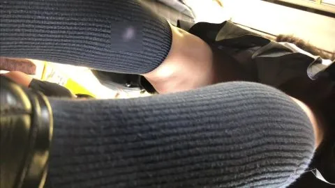 Asian Couple Having Intimate Moment on Public Transport