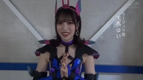 Asian woman in costume plays with props