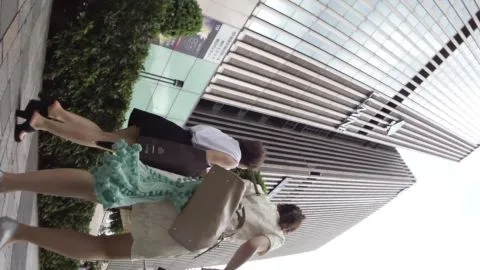 Asian Girls in City Street and Clothing Store