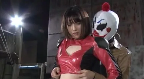 Asian Women in Armor with Clown and Jacketed Men