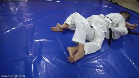 Asian Lesbians Grappling in Martial Arts Gym