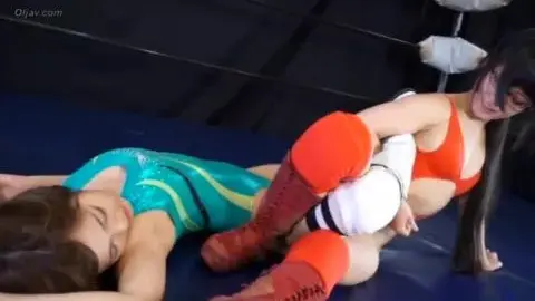 Asian Lesbians Wrestling in Ring