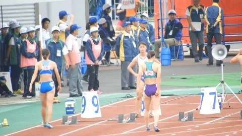 Asian Girls Running on Track