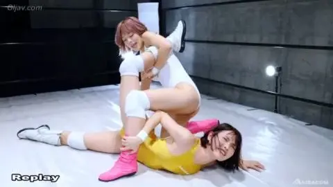 Asian Redhead Wrestles Brunette