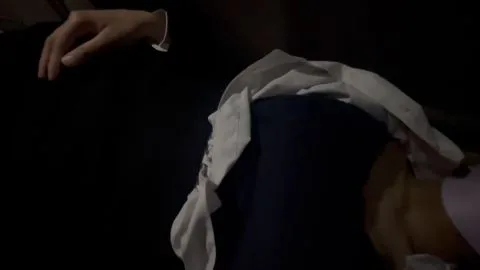 Asian Women in Masks and Lingerie