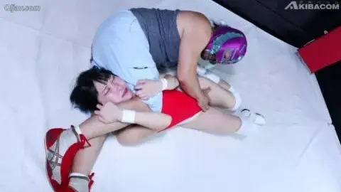 Asian Wrestlers in Bikinis Engage in Intense Match