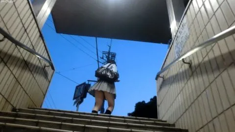 Asian Teen in Gray Skirt on Stairwell