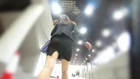 Slim Asian Woman in Business Attire