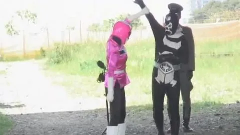 Lesbian Models in Pink Costumes Embracing