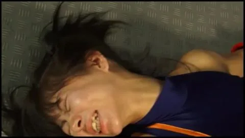 Industrial Fetish Scene with Restraint and Confrontation