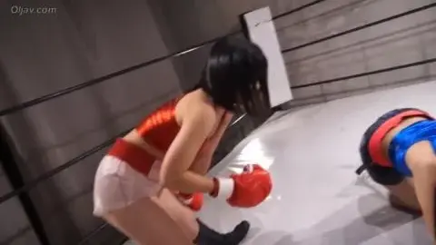Brunettes Engage in Intense Boxing Match