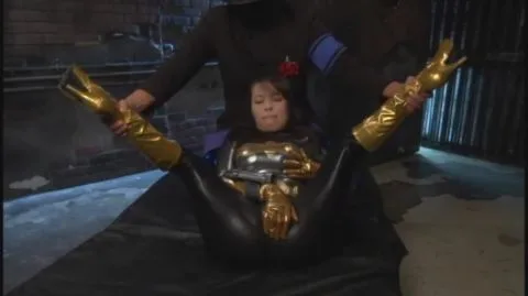 Brunette in Black and Gold Bodysuit Restrained and Fucked