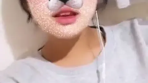 Asian Girl Takes Selfies with Dog Filter