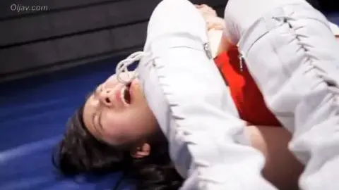 Asian Women Wrestling in Ring
