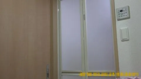 Asian Girl in Bathroom with Towel