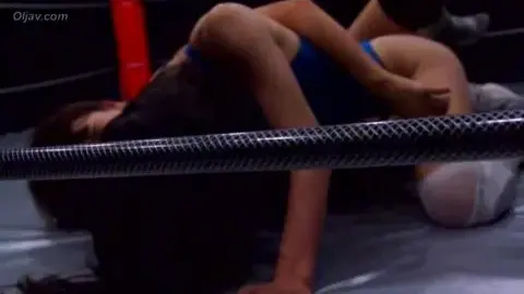 Asian Lesbians Wrestling in Bed