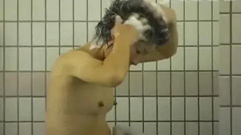 Asian Girls Showering Together in Bathroom