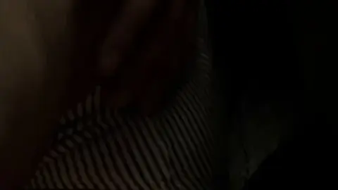 Intimate Bedroom Encounter with Black-Haired Couple