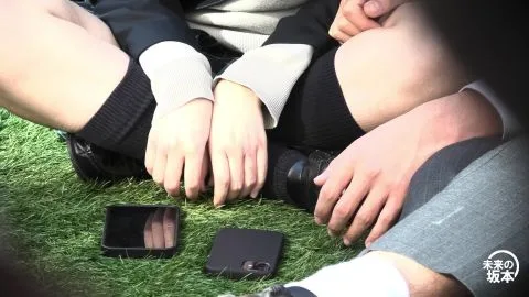 Asian Girls Intimate Moment in Grass Field