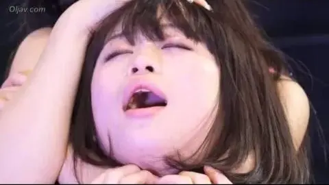 Asian Wrestlers Engage in Intense Match