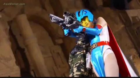 Asian Cosplay Erotica with Gun and Skirt