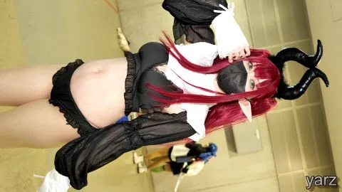 Asian Cosplayer in Devil Costume