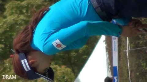 Redhead Golf Scene with Caucasian Couple