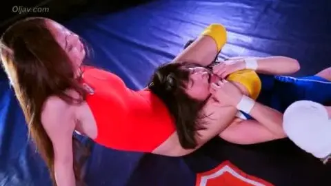 Asian Lesbians Wrestling in Ring
