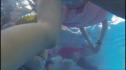 Three Women Swimming in Swimwear