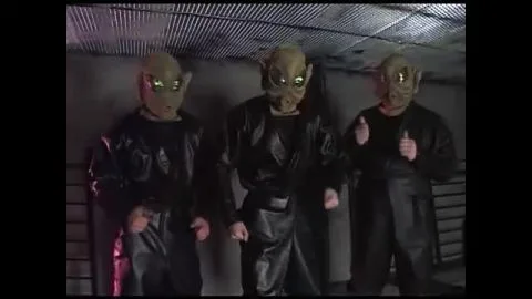 Asian Women in Fishnet Stockings Perform in Dark Room