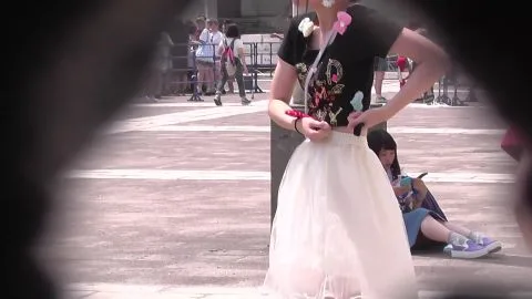 Asian Girls in White Skirts on Street