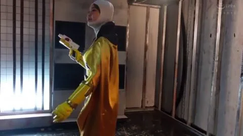 Asian Cosplay Tease in Industrial Setting