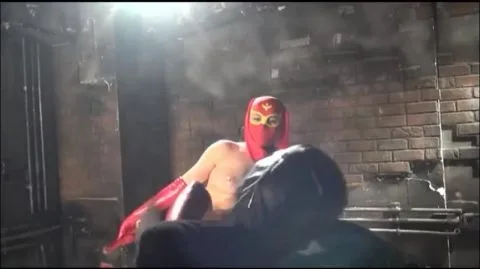 Industrial Fetish Scene with Red Mask