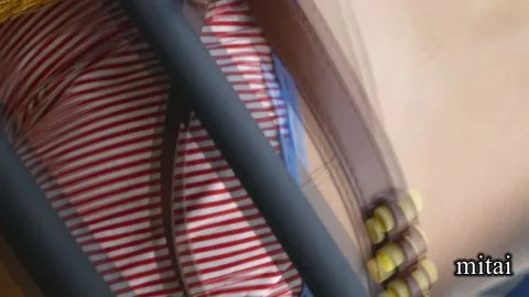 Asian Models in Costume Embrace and Pose