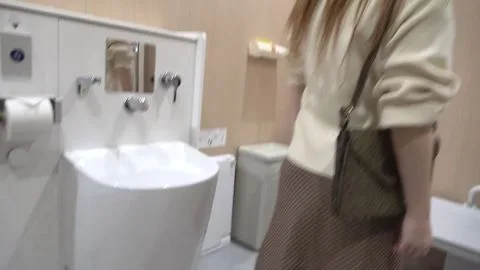 Brunette Teen Undresses and Plays