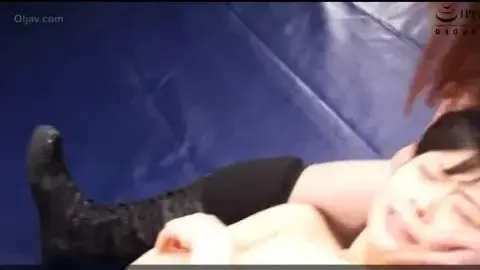Asian Lesbians Wrestling in Ring