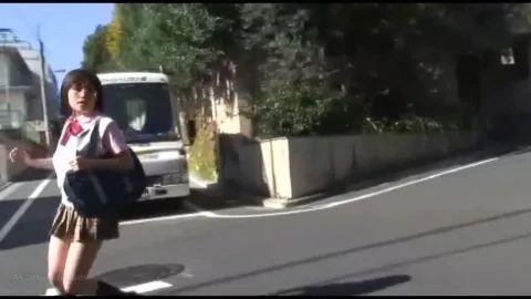 Asian Teen in School Uniform and Superhero Costume